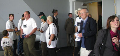Audience leaving the hearing